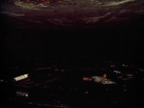 The tunnel ended with trash. So much trash we literally couldn’t push our kayaks any further.