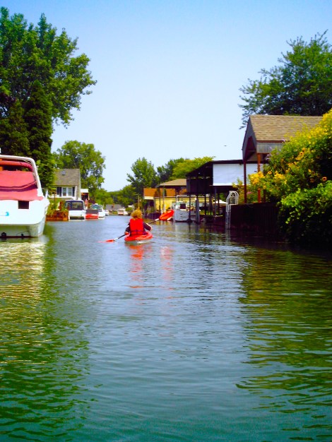 Kayaking through the neighborhood.